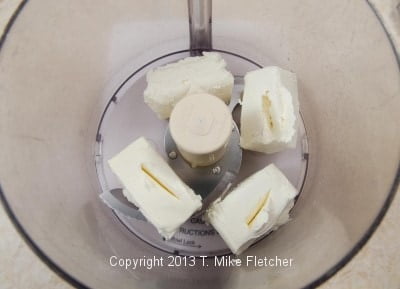 Cream cheese in processor
