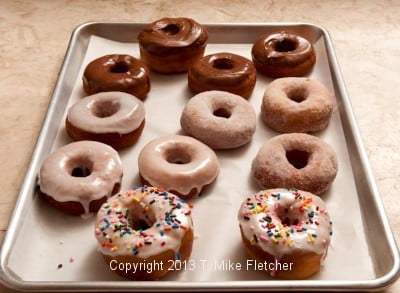 tray of iced doughnuts