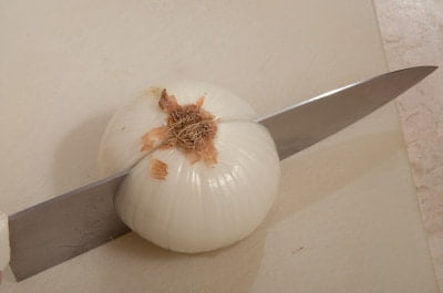 cutting onion in half