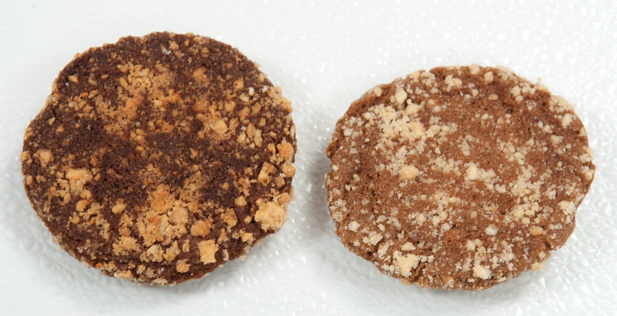 Two cookie bottoms - on the left nearly burned on the right browned correctly