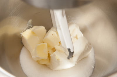 Butter, cream cheese and sugar in mixing bowl