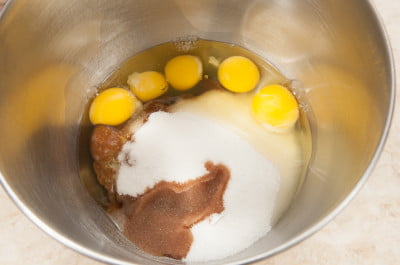 Eggs, sugars in bowl