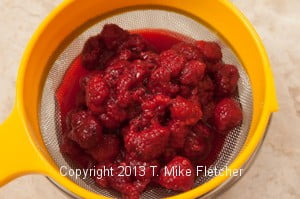 Raspberries in strainer