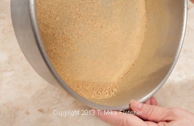 Crumbing sides of pan