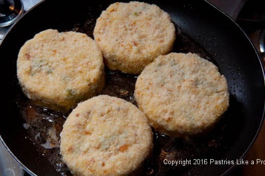 Frying risotto cakes for the Lemon Asparagus Risotto Cakes