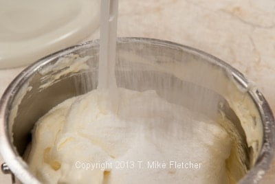 Sifting flour over batter second time