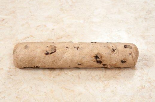 Dough rolled into a log for Hot Cross Buns