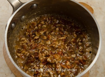 Pecans added to caramel