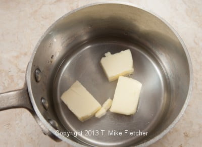 Water, butter & salt in pan