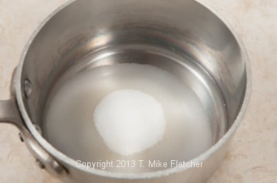 water and sugar in pan