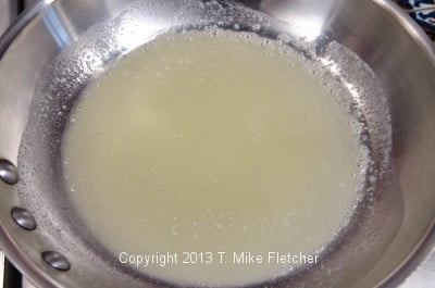 Butter melted in pan