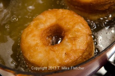 Golden doughnuts in oil