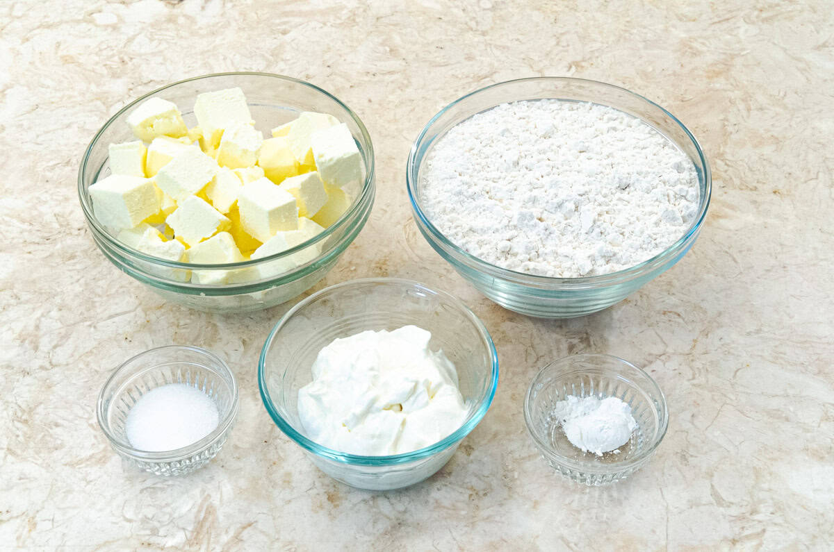 The pastry dough ingredients for the Apple Caramel Hand Pies are baking powder, sour cream, salt, unsalted butter and all-purpose flour. 