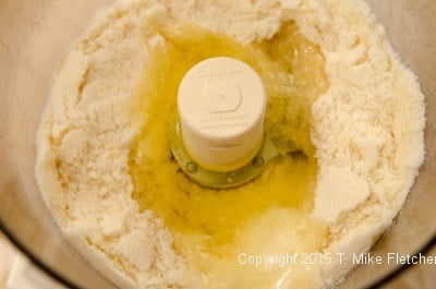 Egg whites added to the almond paste mixture