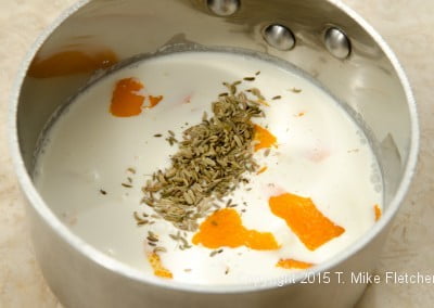 Creams, fennel, orange in pan