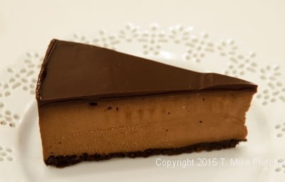 Single slice of Triple Chocolate Cheesecake