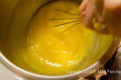 Whisk egg mixture over hot water for Viennese Apricot Torte