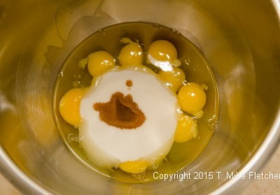 Eggs, sugar, vanilla in bowl for Viennese Apricot Torte