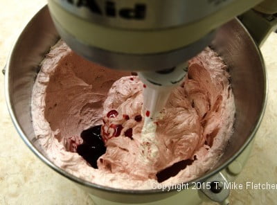 Adding raspberry jam to buttercream