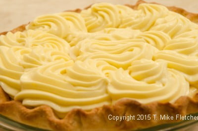 Pastry Cream piped completely over the bananas for the Double Banana Caramel Cream Pie