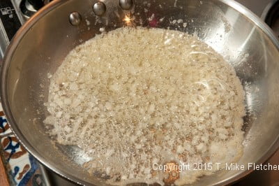 Shallots cooking for Seafood Crepes