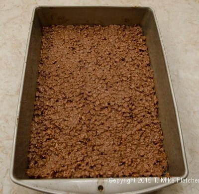 Base spread in the bottom of the pan for Hazelnut Crunch Bars