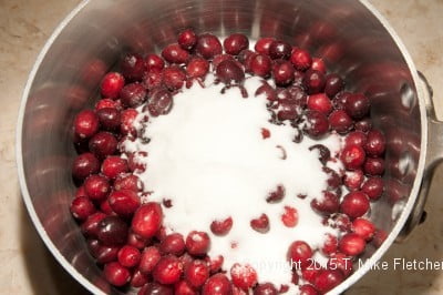 Cranberries, water and sugar in saucepan for Cranberries Fresh Pineapple Relish