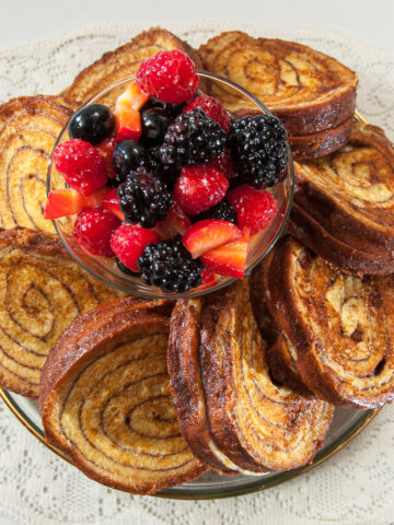 Cinnamon French Toast with Berries in an Orange Sauce