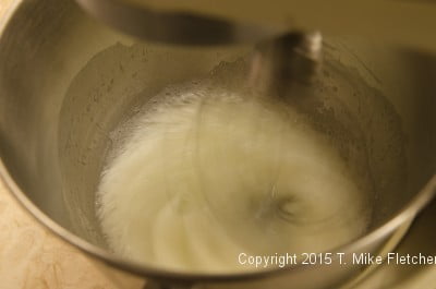 Egg whites beaten just before sugar is added for the Double Chocolate Mousse Cake