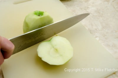 Cutting apple for Apple Crostatas with Pastry Cream