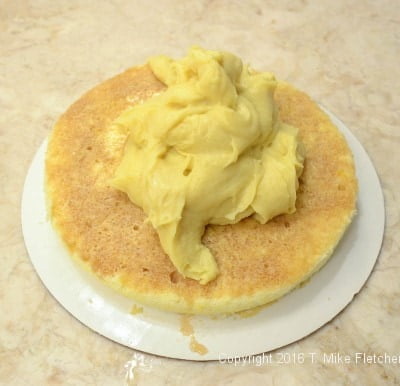 Pastry cream on bottom layer for the Boston Cream Pie