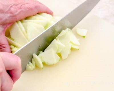 Roughly cutting apples for Apple Crostatas with Pastry Cream