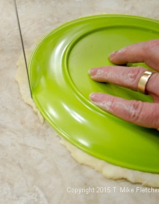 Trimming pastry for Apple Crostatas with Pastry Cream