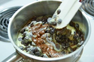 Fudge ingredients melting for Two Ingredient Fudge Hearts