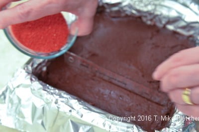 Red sugar on fudge for Two Ingredient Fudge Hearts