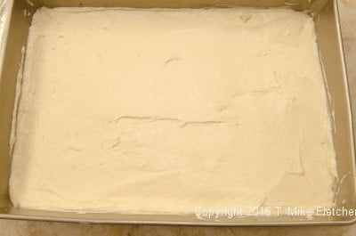 Cake batter spread for the New York Crumb Cake