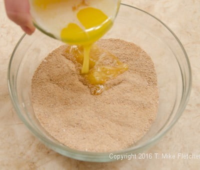 Butter added to crumbs for S'Mores Bars