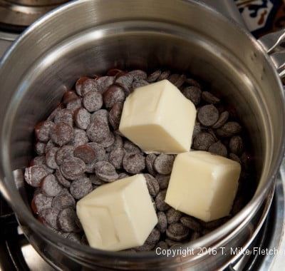 Chocolate and butter in a double boiler for the Mocha Kahlua Brownies