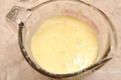 Liquid ingredients mixed for the lemon Raspberry Pudding Cake