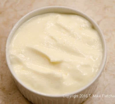 Filled ramekin for the Lemon Raspberry Pudding Cake