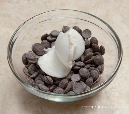 Chocolate and crisco in a bowl to melt for the Almond Macaroons