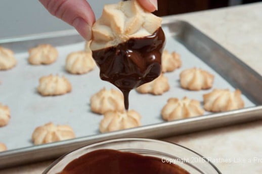 Chocolate dripping off for Almond Macaroons