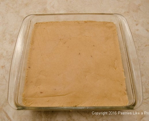 Filling spread over crust for the No Bake Peanut Butter Bars