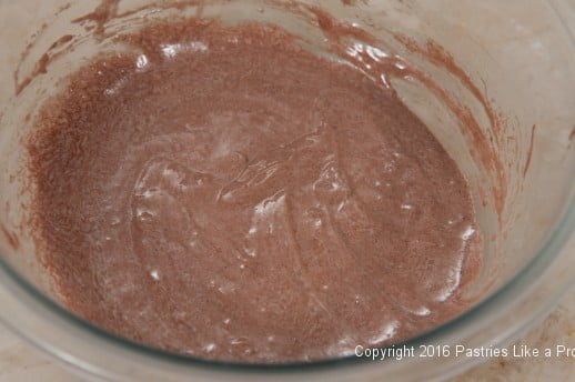 Batter and butter whisked together for the Chocolate Raspberry Gateau