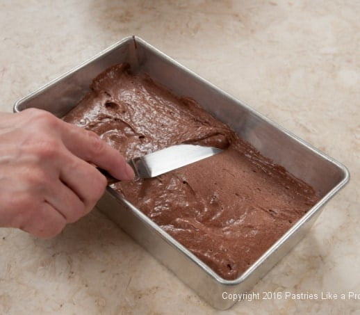 Smoothing the top of the cake batter for the Chocolate Raspberry Gateau