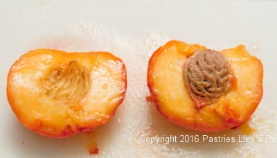 Pit removed from the peach for the Roasted Peaches with Amaretti Crisp
