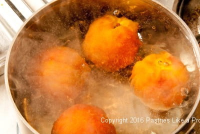 Peaches boiling for Roasted Peaches with Amaretti Crisp