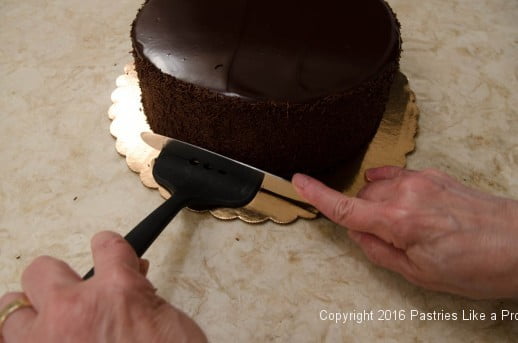 Removing the pancake turner for the Chocolate Strawberry Ruffle Cake