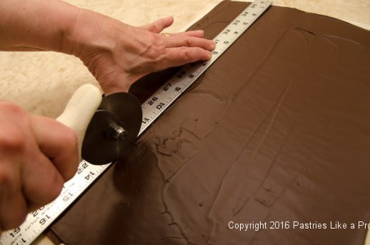 Cutting the chocolate into panels for the Chocolate Rasperry Gateau