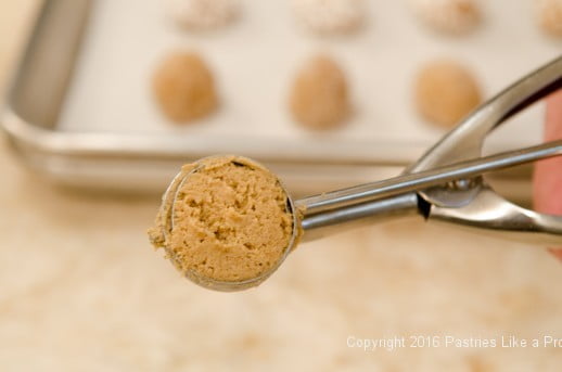 Flat scoop of batter for Triple Ginger Crisps